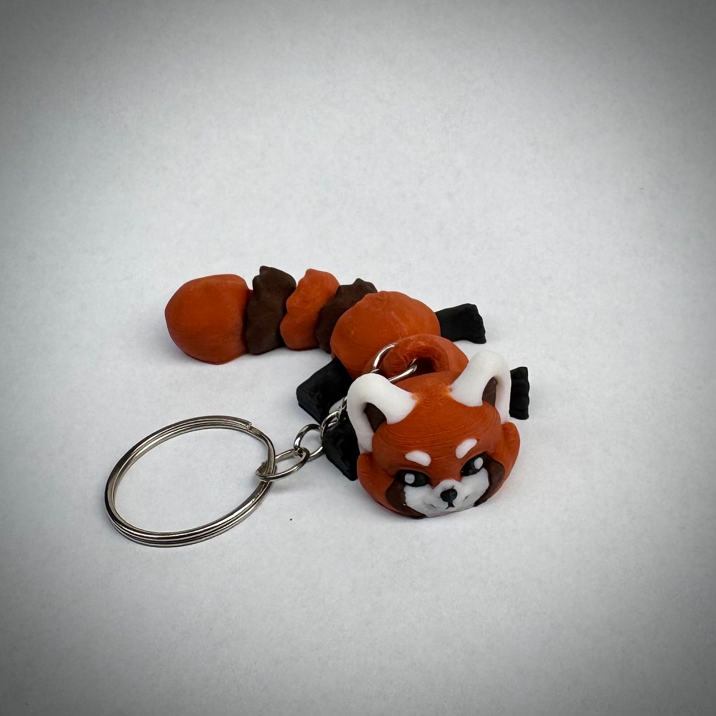 Baby rode panda sleutelhanger