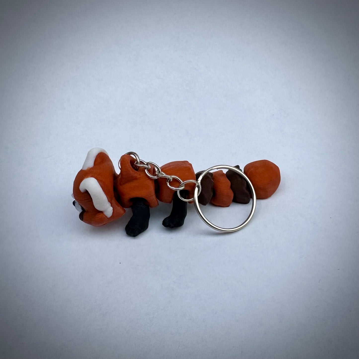 Baby rode panda sleutelhanger