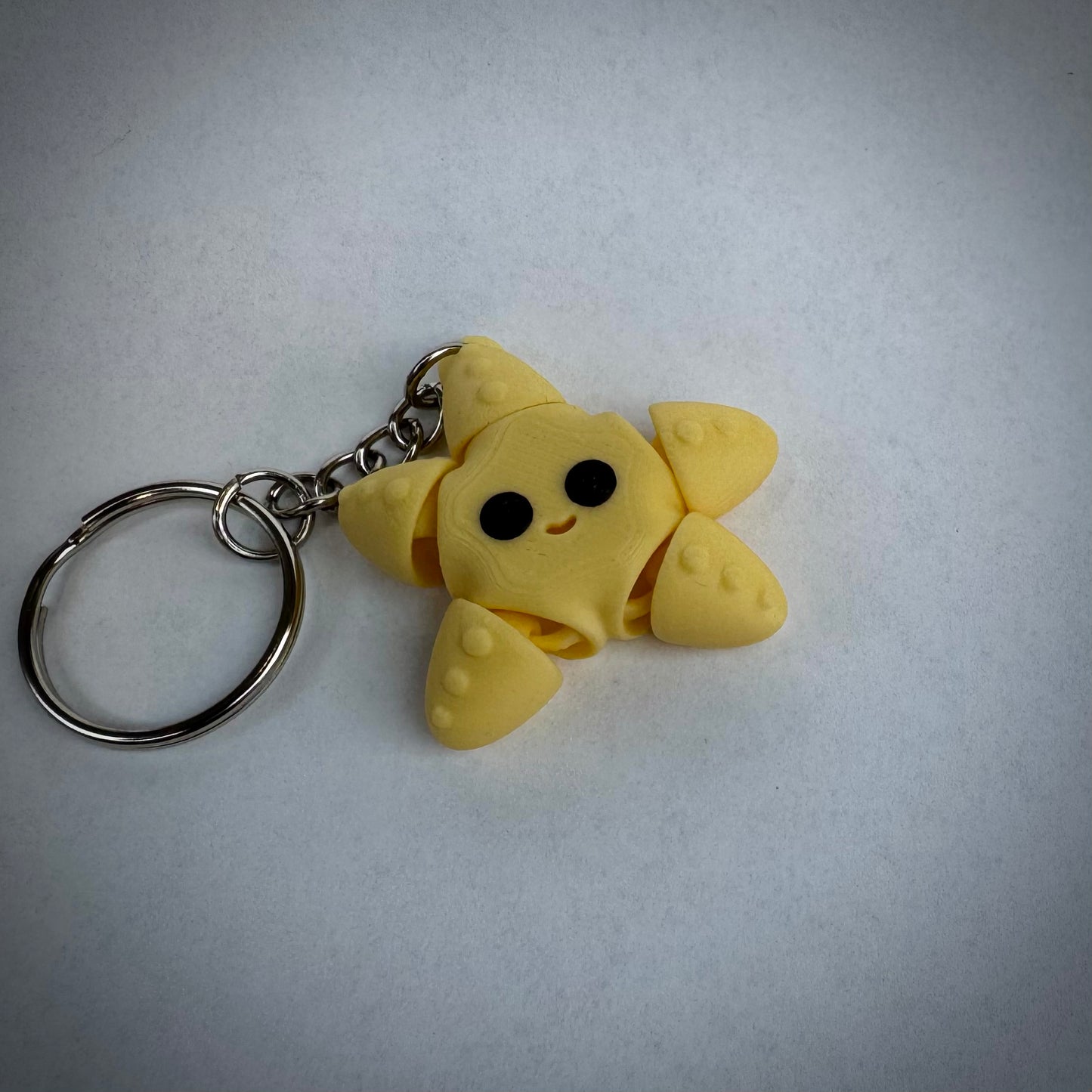 Baby zeester sleutelhanger